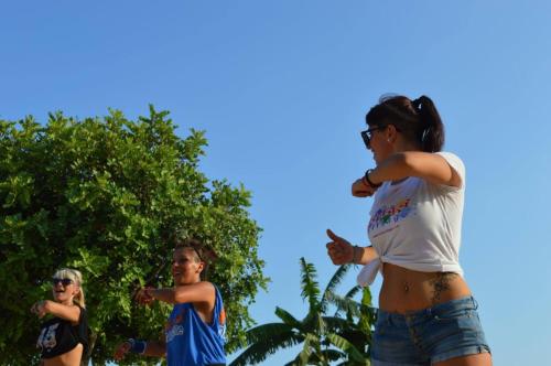a group of people standing next to some trees at Kikki Village in Modica