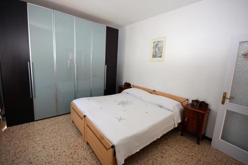 Postel nebo postele na pokoji v ubytování Nonna Ambrosina