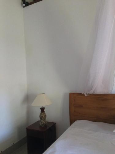 Postel nebo postele na pokoji v ubytování Gili Beach