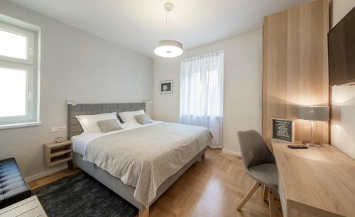 Katil atau katil-katil dalam bilik di Apartments N10 Zagreb