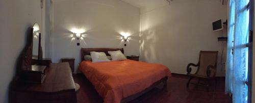 מיטה או מיטות בחדר ב-Le Bleuet