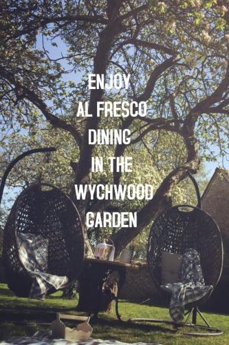 an image of a tree with a quote at The Wychwood Inn in Shipton under Wychwood