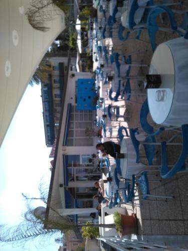 a long line of chairs at a water park at B&B Di Marco in Giardini Naxos