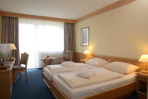 Hotel Kaiseralmにあるベッド