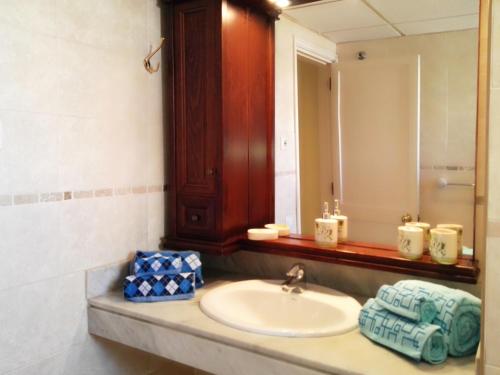 Koupelna v ubytování Playa de las Cucharas Apartments