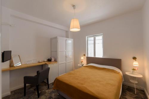 A bed or beds in a room at Filenia
