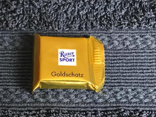 a yellow rage sport wallet with a sticker on it at Chata Rosa in Malenovice