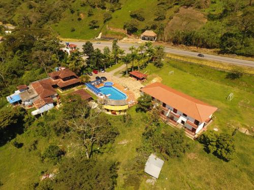 an aerial view of a house with a swimming pool at Rincon Oibano in Oiba