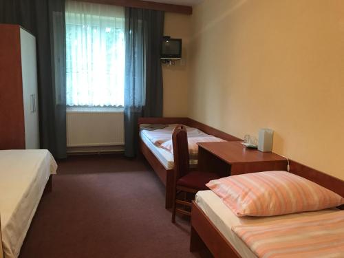 Postel nebo postele na pokoji v ubytování Chata Rosa