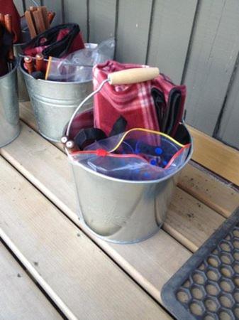 two buckets sitting on a table next to a keyboard at Driftwood by the Sea Inn in Campbell River