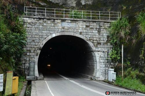 a tunnel with a road going through it at Tea Hills Bungalow in Hatton