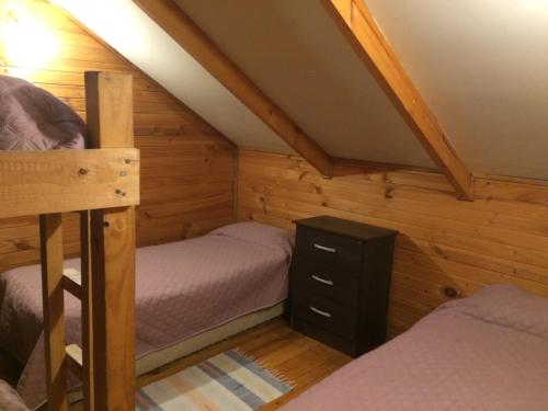Ένα ή περισσότερα κρεβάτια σε δωμάτιο στο Turismo Montaña