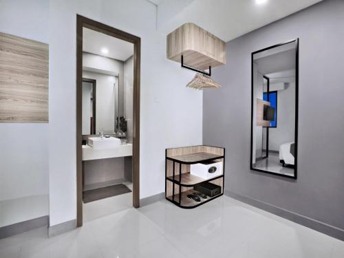 Koupelna v ubytování Hotel Neo Gajah Mada Pontianak by ASTON