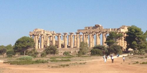 a large building with people walking in front of it at Dimora La Grazia in Castelvetrano Selinunte