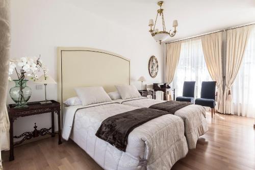 Posteľ alebo postele v izbe v ubytovaní Hotel Pazo de Berbetoros
