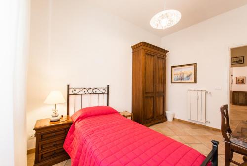 En eller flere senger på et rom på Maison Velia San Giovanni