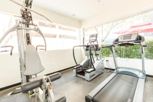 a gym with two treadmills and a treadmill at ibis Styles Singapore Albert in Singapore