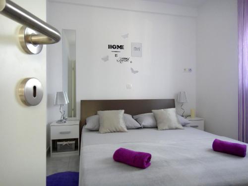 Posteľ alebo postele v izbe v ubytovaní Apartments Blu Mare