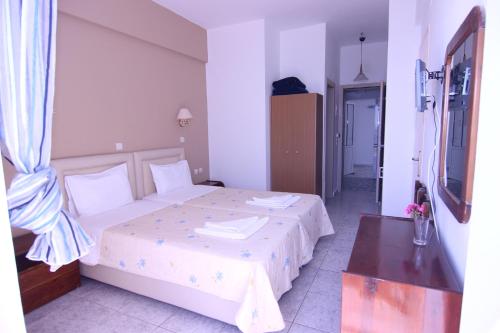 Katil atau katil-katil dalam bilik di Creta Mare Hotel