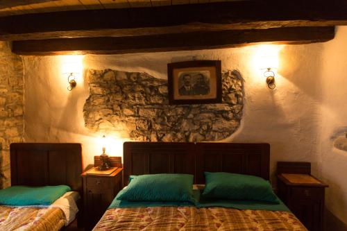 Postelja oz. postelje v sobi nastanitve Tourist Farm Benčič
