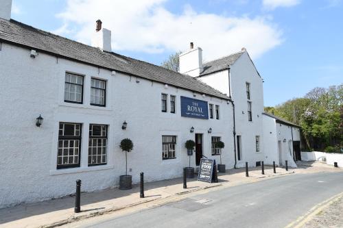 a white building on the side of a street at The Royal Heysham in Heysham