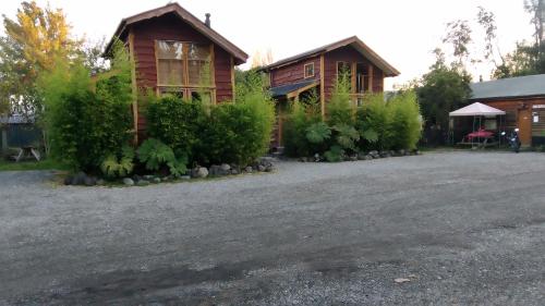 a house with a driveway in front of it at Turismo Montaña in Ensenada