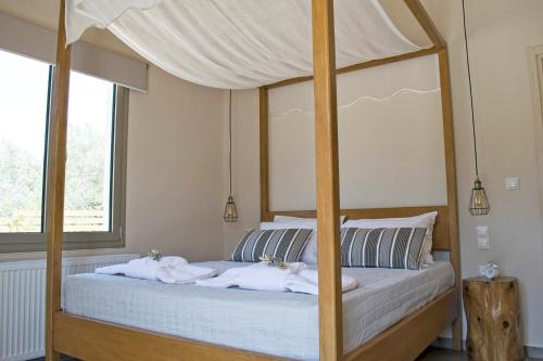 Llit o llits en una habitació de Villa Merina