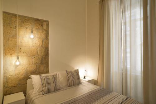 Ένα ή περισσότερα κρεβάτια σε δωμάτιο στο B&B EMME21