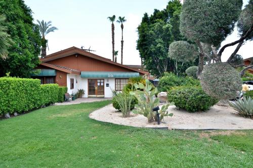 a house with a garden in front of it at The Inn at Deep Canyon in Palm Desert