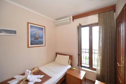 Postel nebo postele na pokoji v ubytování Hotel Anderba