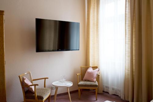 TV a/nebo společenská místnost v ubytování AMSEL VINTAGE Rooms