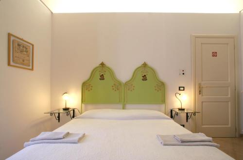 En eller flere senge i et værelse på Novecento