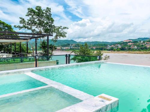 Gallery image of Chiangkhong Teak Garden Riverfront Onsen Hotel- SHA Extra Plus in Chiang Khong