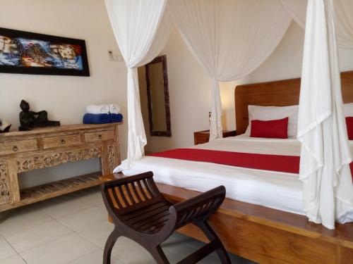 Ένα ή περισσότερα κρεβάτια σε δωμάτιο στο Villa Esa Ubud