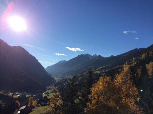 a view of a valley with mountains in the background at Hotel Garni Central - Zimmer - Studios - Apartments in Kappl