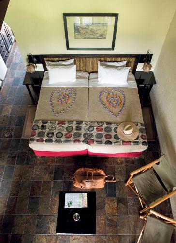 Katil atau katil-katil dalam bilik di Hippo Hollow Country Estate