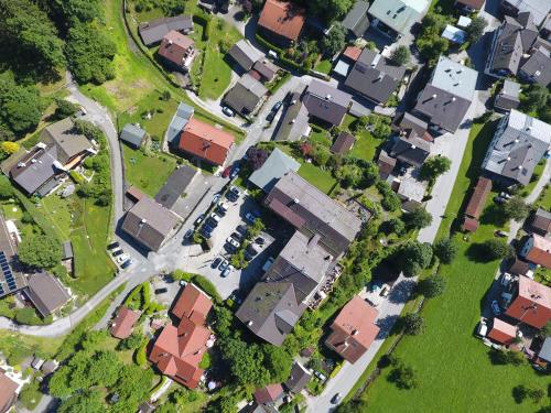 an overhead view of a residential suburb with houses at Romantik Alpenhotel Waxenstein in Grainau