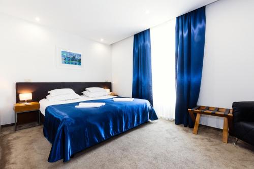Postel nebo postele na pokoji v ubytování Hotel Marul