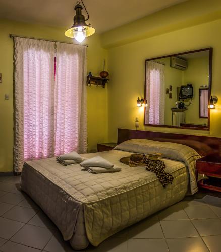 Postel nebo postele na pokoji v ubytování Hotel Mato