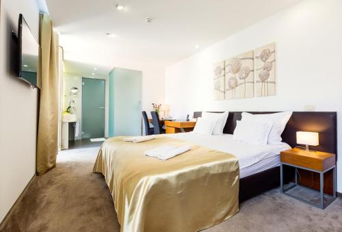 מיטה או מיטות בחדר ב-Hotel Marul