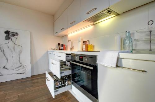 Kuchyň nebo kuchyňský kout v ubytování Loft 65 Panoramic View
