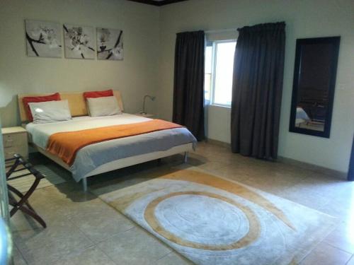 מיטה או מיטות בחדר ב-Planet Hotel HollyBum