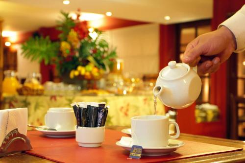 Příslušenství pro přípravu čaje a kávy v ubytování Hotel Libertador