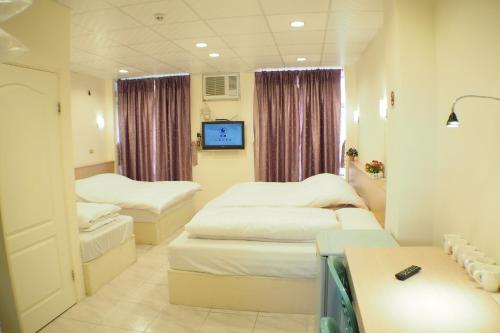 Katil atau katil-katil dalam bilik di Sun Moon Star Hostel