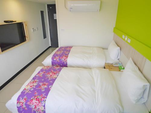 Good Night Hotelにあるベッド