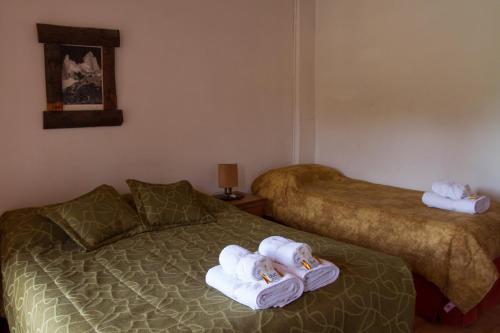 Katil atau katil-katil dalam bilik di Hosteria Thiamalu