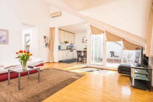 Postel nebo postele na pokoji v ubytování Appartements Ferchergasse