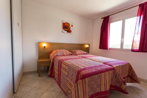 Ένα ή περισσότερα κρεβάτια σε δωμάτιο στο Villa 8 De Oranje Tulp