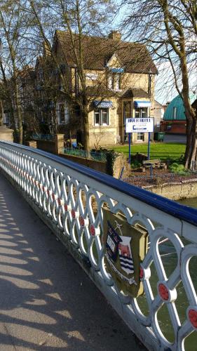 a metal fence in front of a house at River Hotel in Oxford