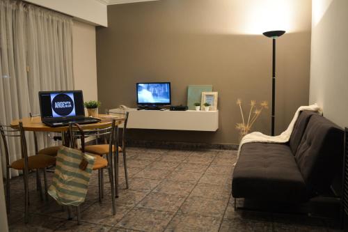 TV i/ili multimedijalni sistem u objektu Argenta Apart Hotel